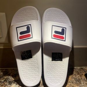 Brand new fila sandals. Size men’s 10. Women’s 11